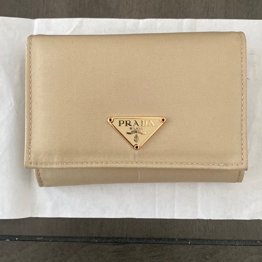 Authentic Prada wallet gold/beige with box used once (not leather)